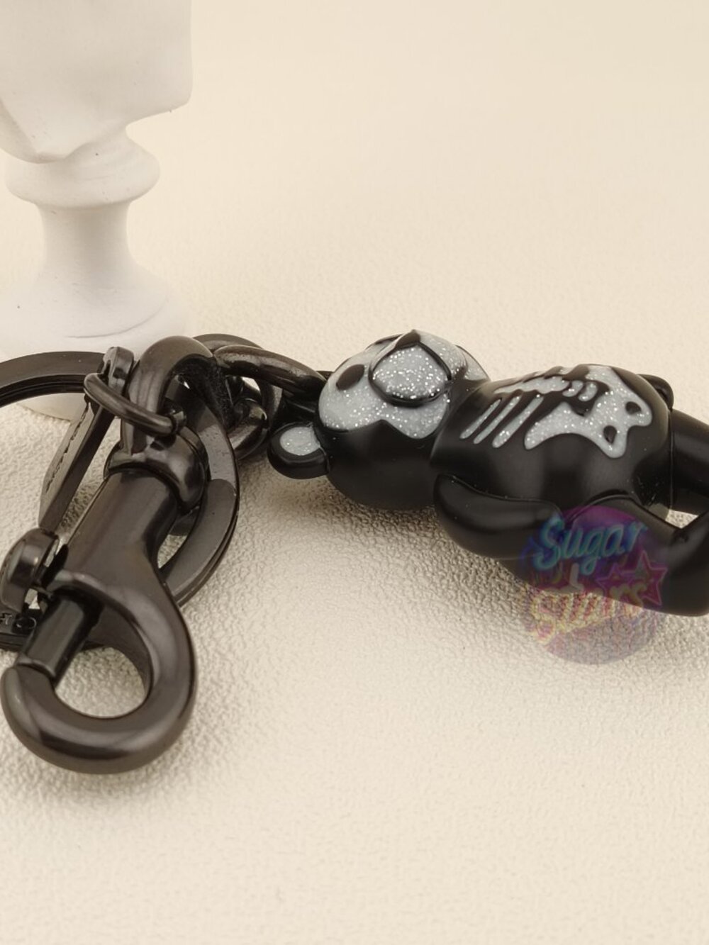 COACH Black Teddy Bear Keychain with Silver Glitter Accent - Picture 2 of 6